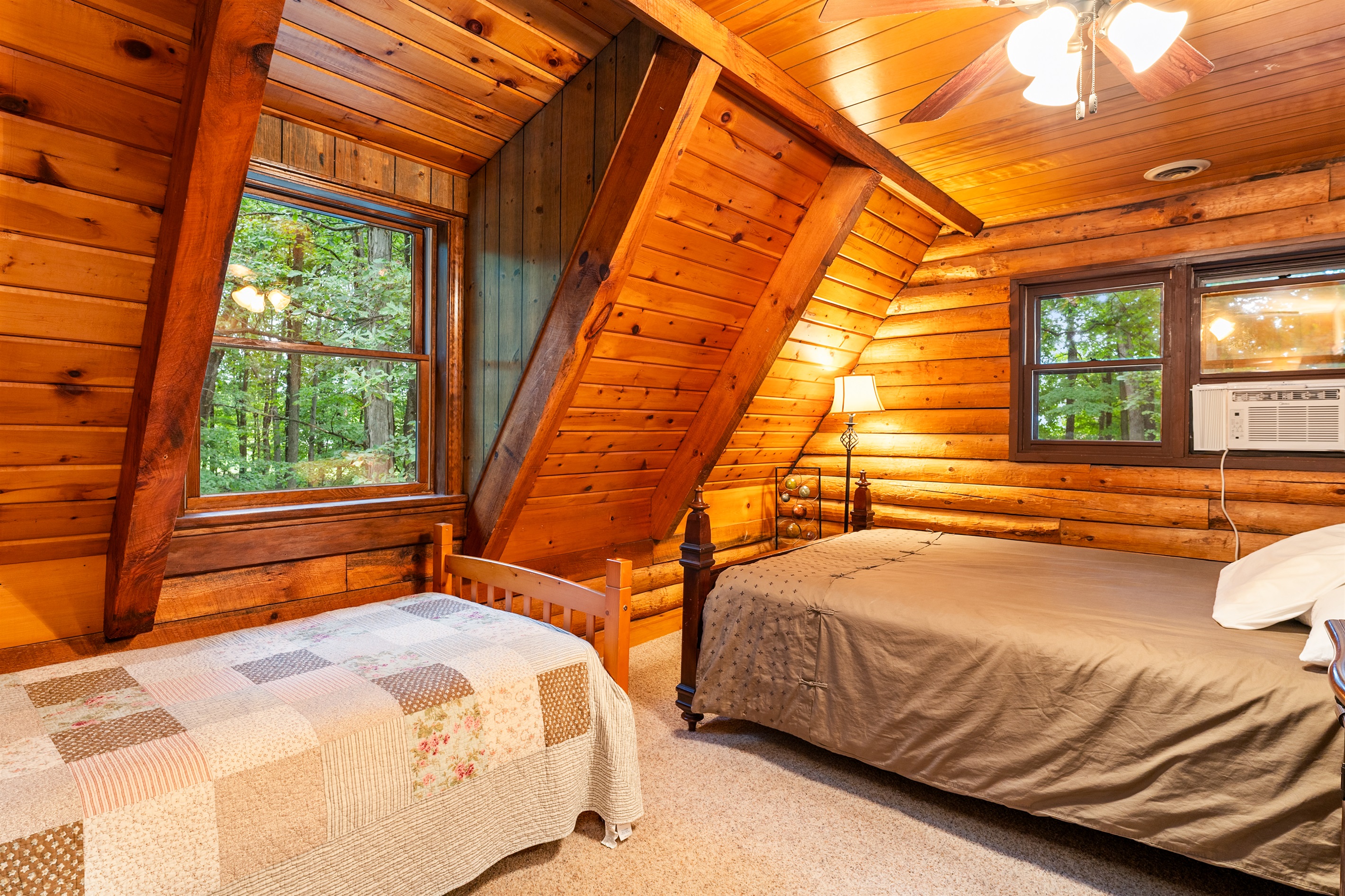 Bedroom #3 Cozy cabin-style bedroom with queen and twin and direct access to the hallway for added convenience.