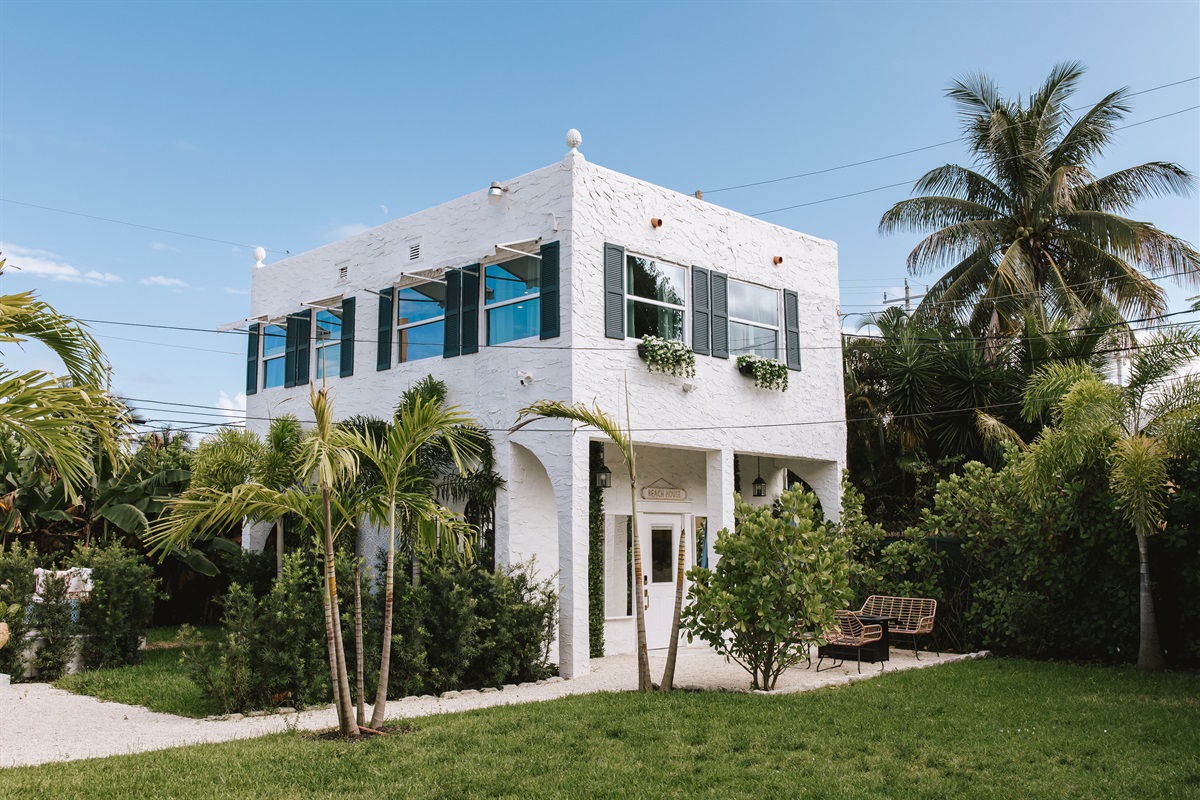 A view of the rear cottage from across the lawn, illustrating how spacious and peaceful our grounds are.