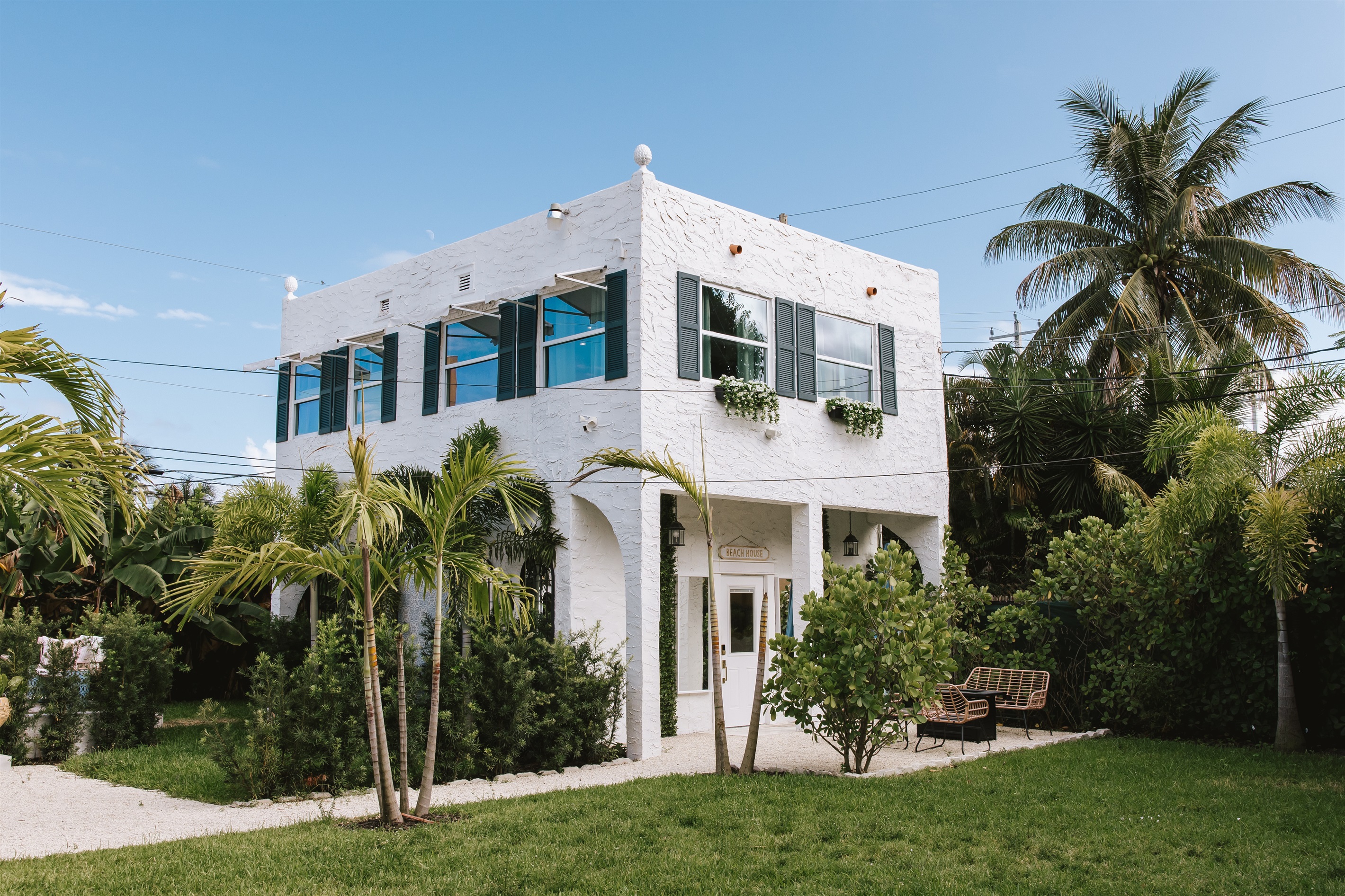 A view of the rear cottage from across the lawn, illustrating how spacious and peaceful our grounds are.