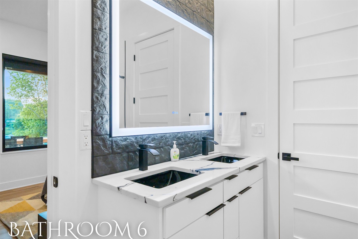 A touch of luxury in every detail. This bathroom is both functional and beautiful.