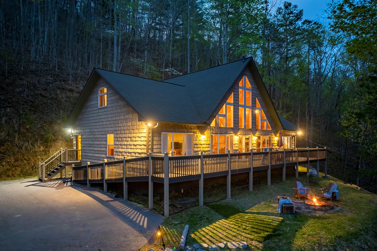 Exterior Oasis: Experience warmth and charm with stunning views and inviting outdoor firepit!