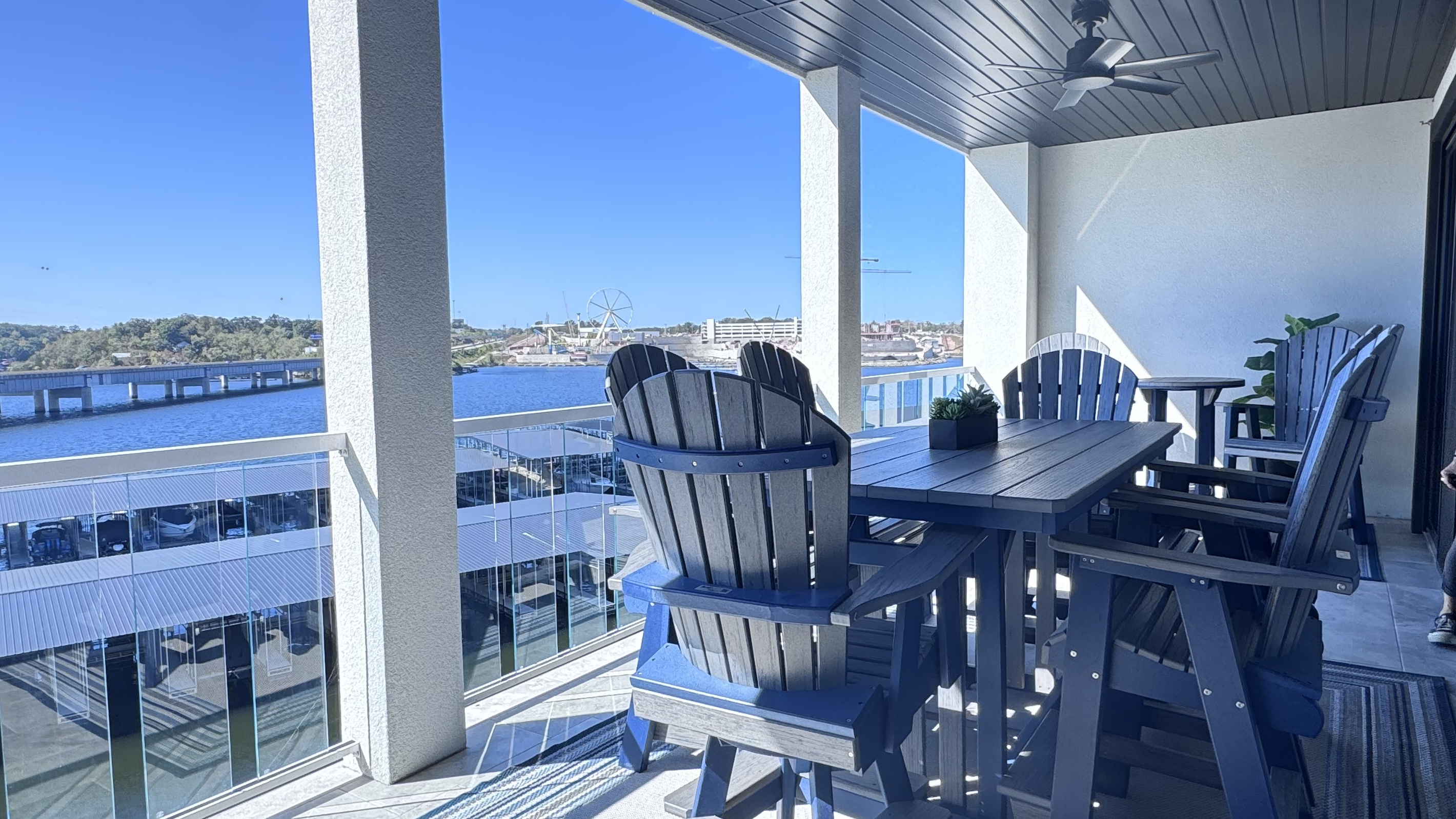 El fresco dining, games, or enjoying the views from the private balcony