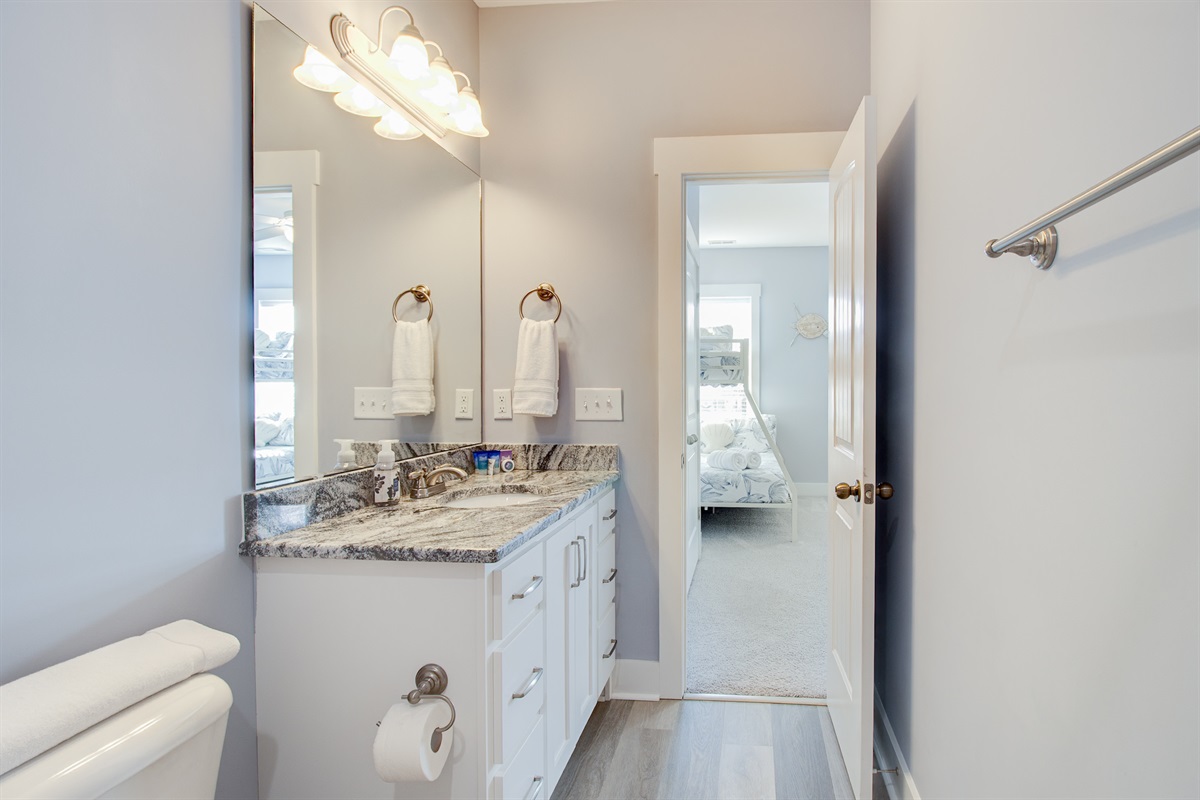 Bright 3rd Bathroom with a spacious vanity and soft coastal finishes