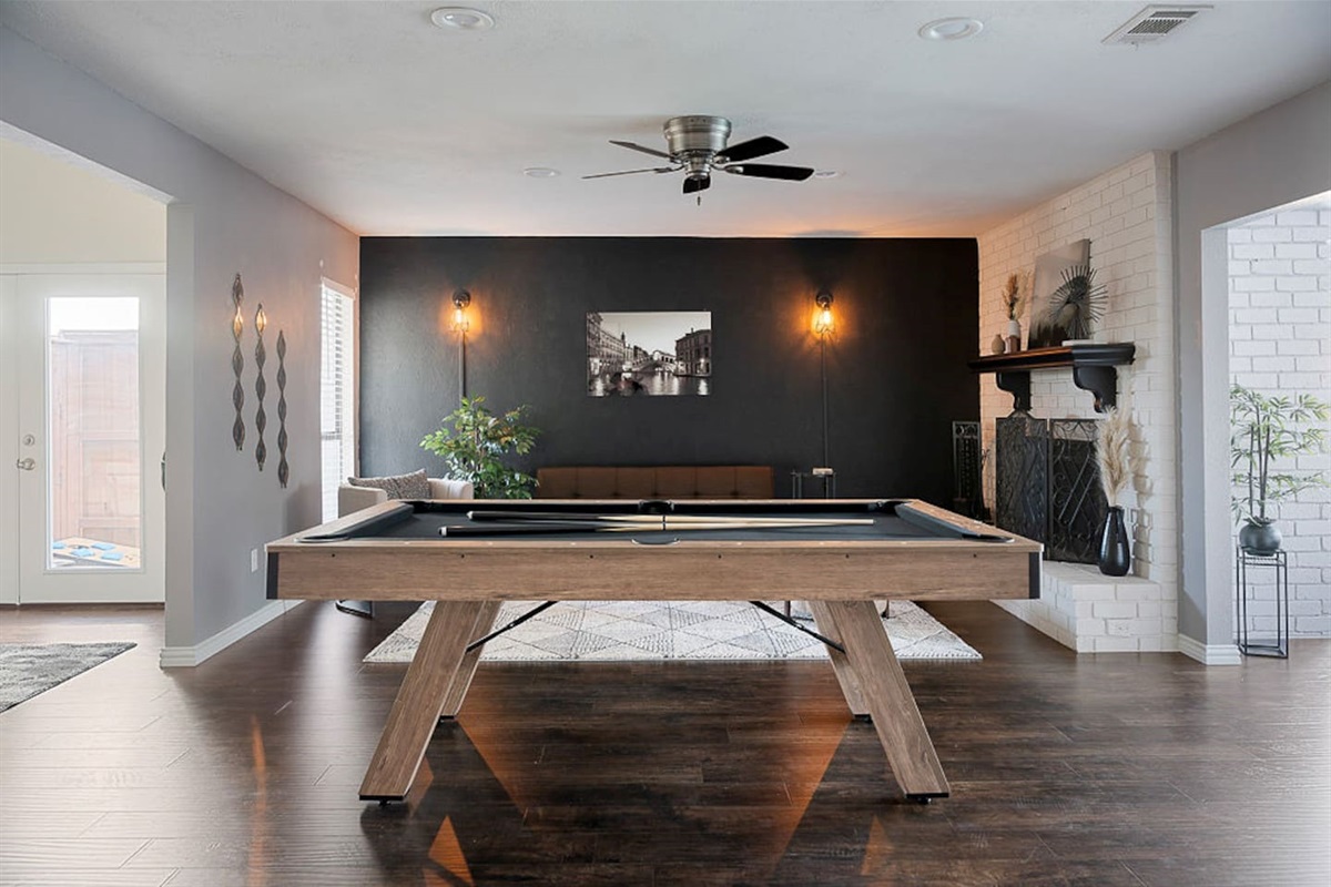 Have some fun with this chic, fully-equipped pool table during your stay. Your group can enjoy conversation amidst the game with the open-concept seating area next to the pool table. There is also an exercise station with yoga mats for your use!