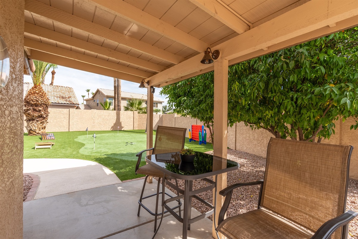 Intimate seating for 2 next to an orchard of orange, lemon, lime and mnadarin orange trees!