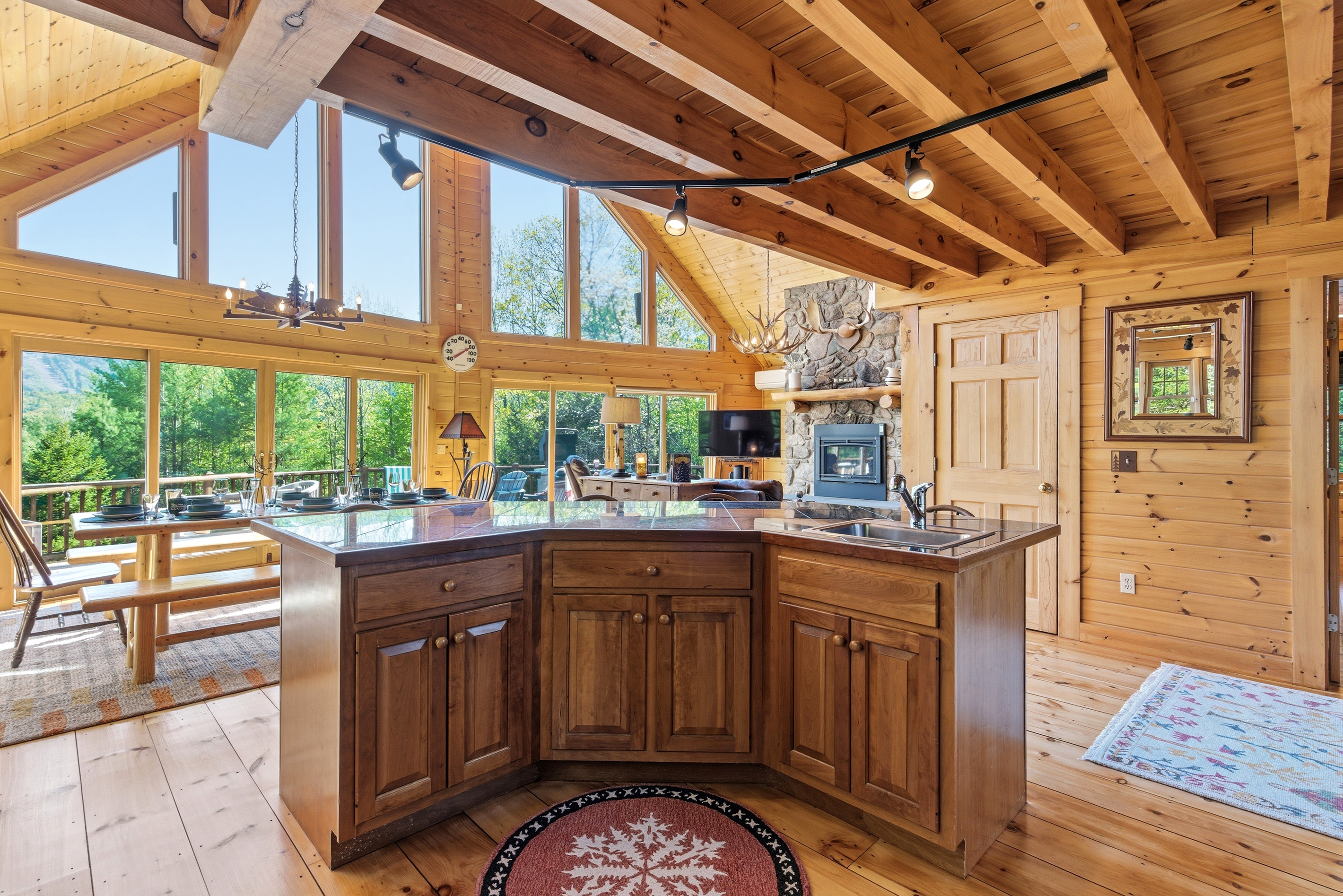 Stay connected with family and friends while cooking in the heart of the cabin.