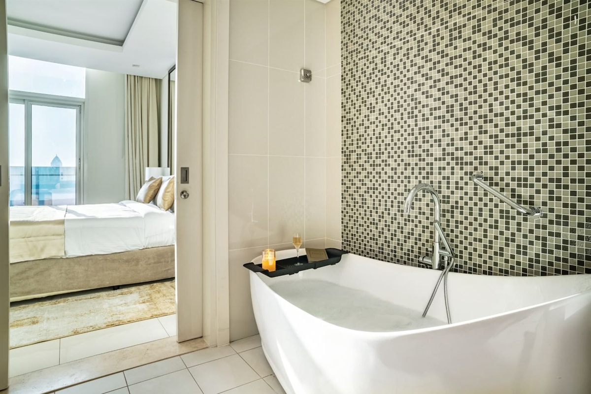 Large bathroom with bath-tube and shower