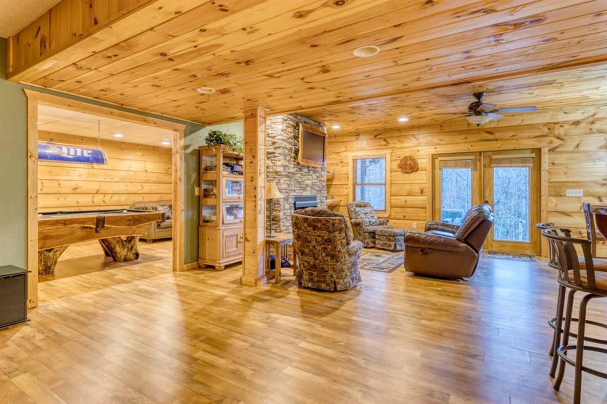 Another spacious game room located inside the cabin.