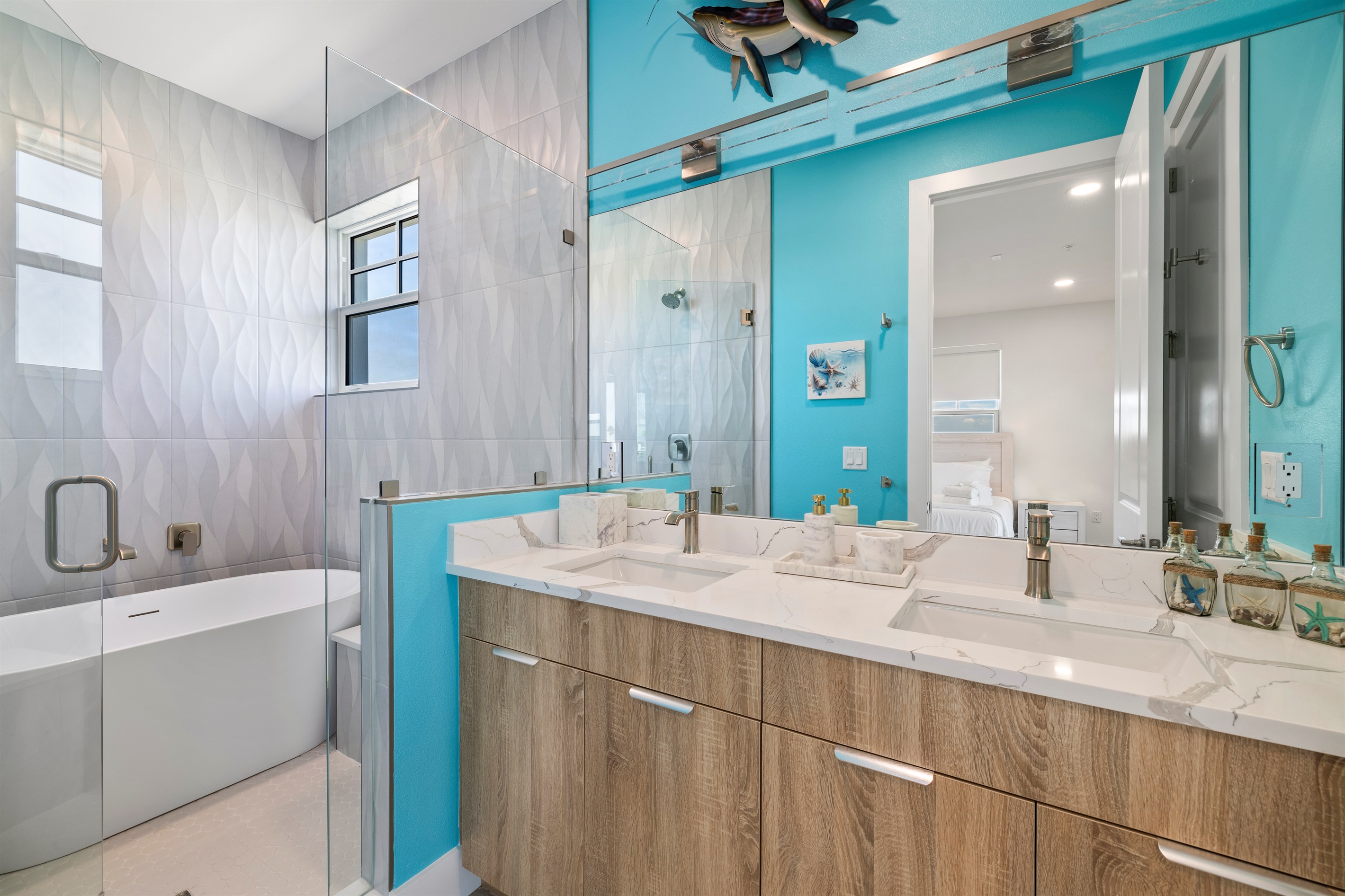 Master suite private bathroom with bathtub and shower