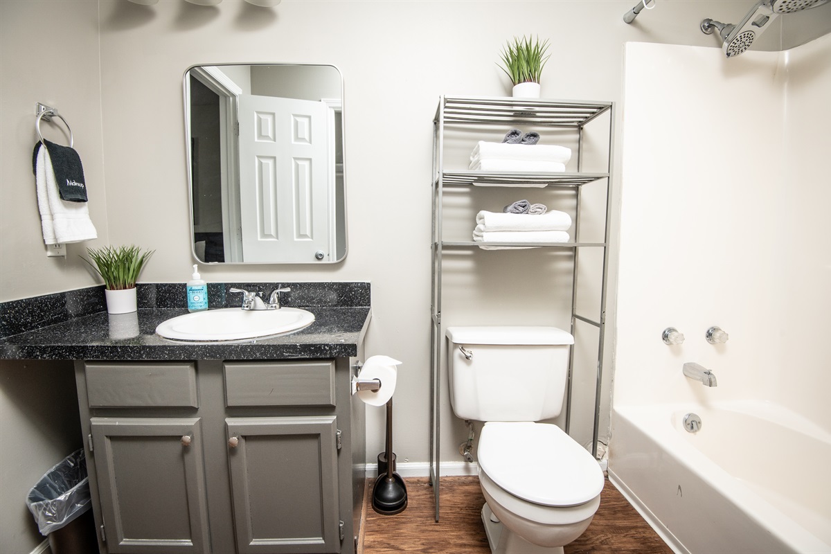 The King bedroom in unit F has a fully stocked ensuite bathroom.