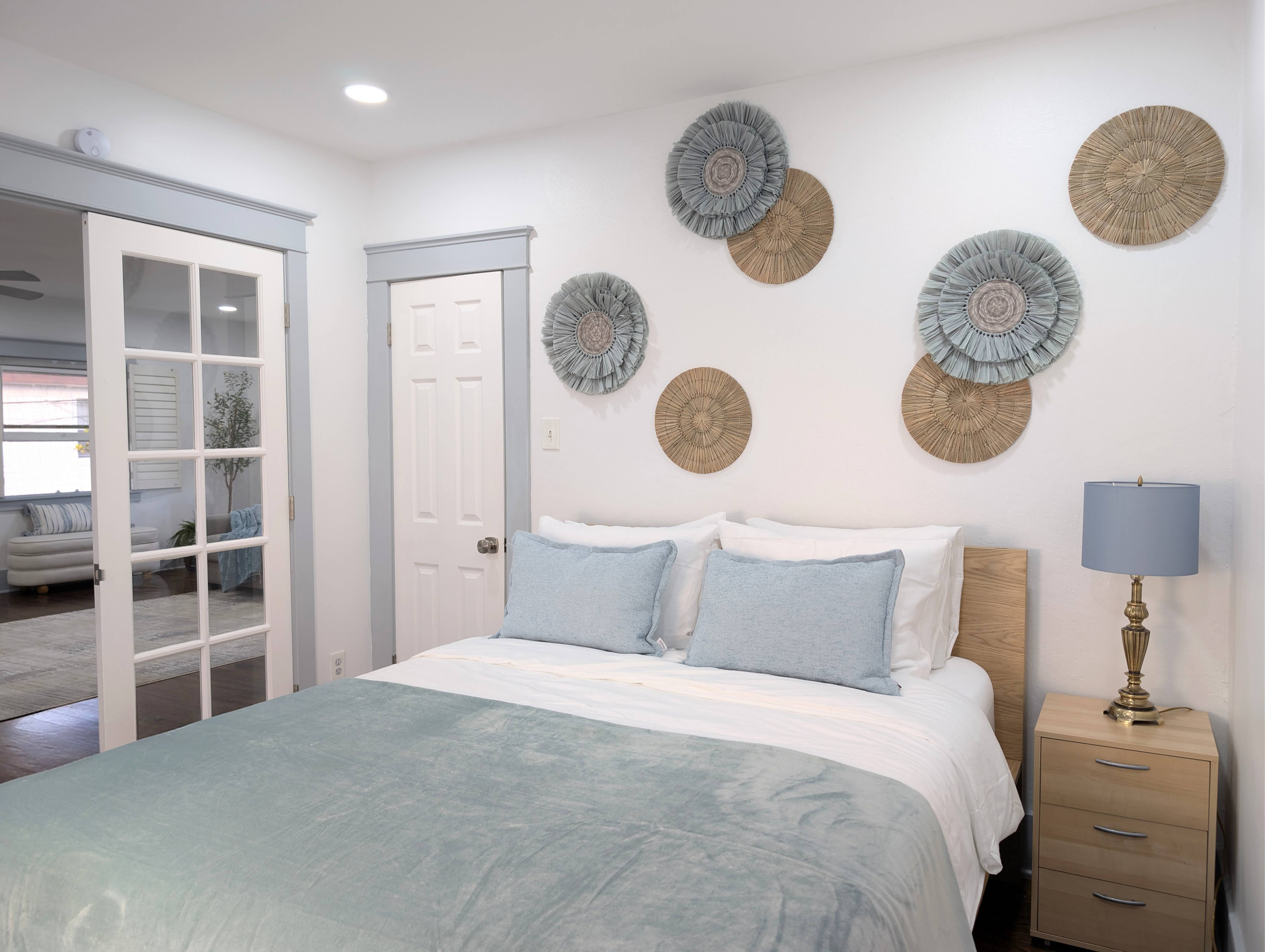 Wake up refreshed in a bright, beautifully designed bedroom where comfort and relaxation come together.