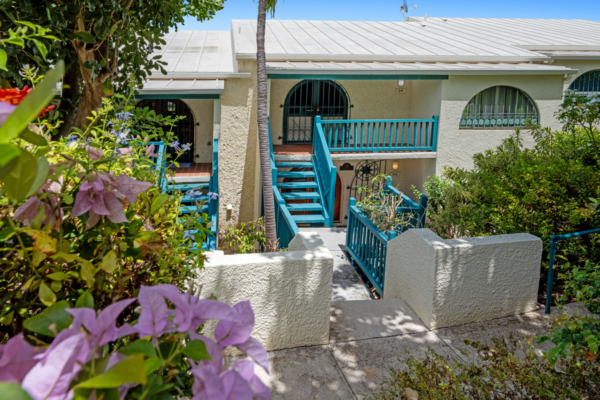 A scenic walkway leads you to your tropical island retreat.