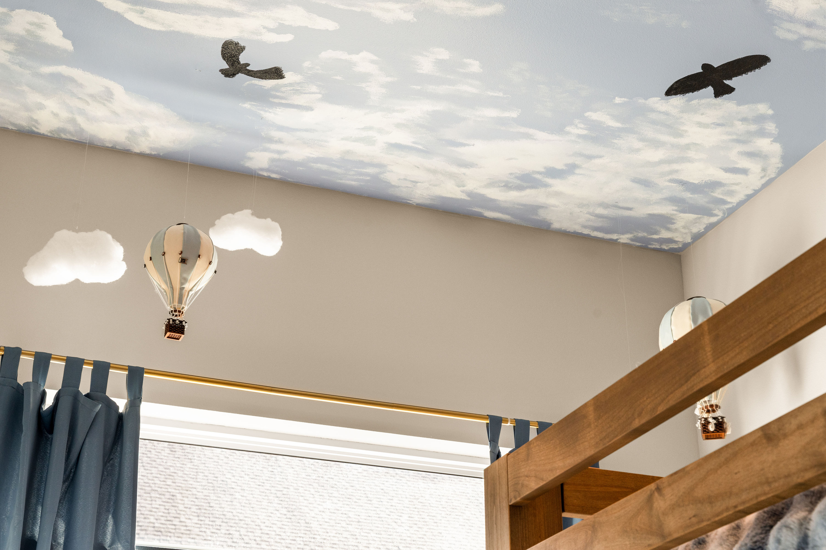 Bunk room ceiling detail

Look up! A dreamy cloud-covered ceiling carries the bunk room’s playful theme all the way overhead.