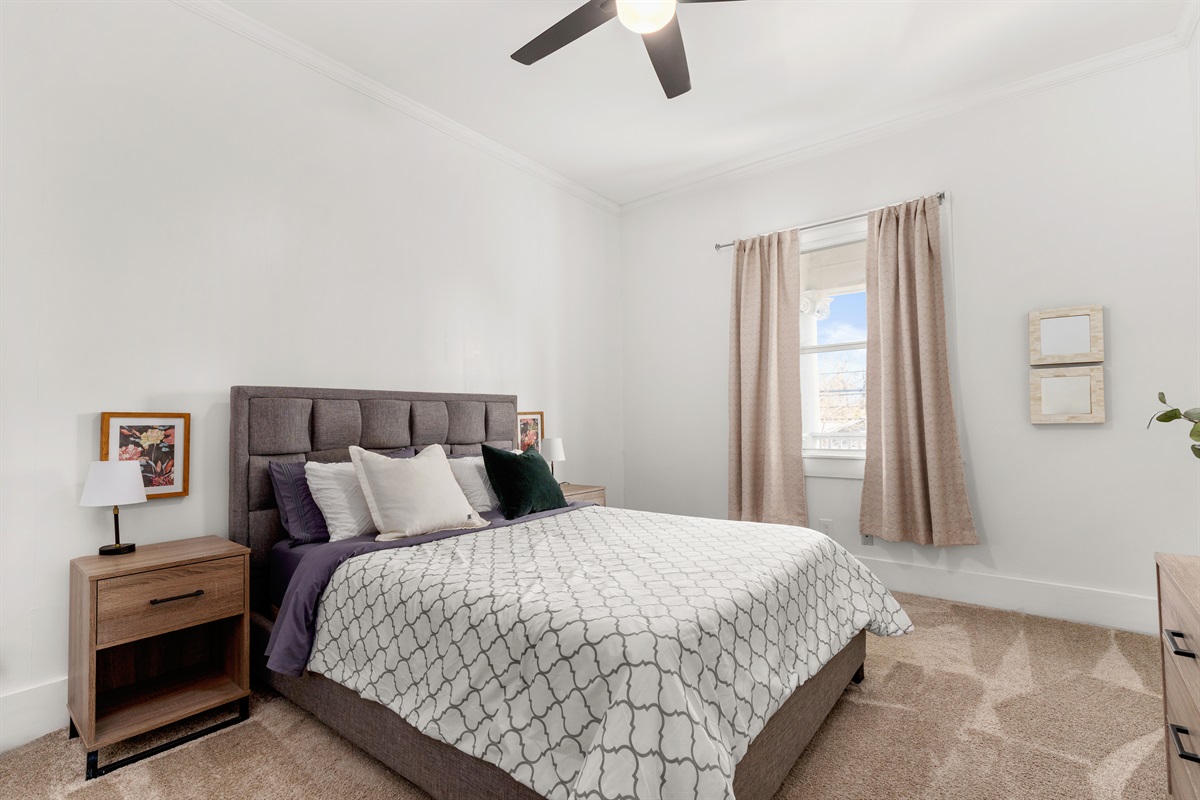From sunrise to sunset, this bedroom is a canvas for dreams, adorned with comfort and personalized charm