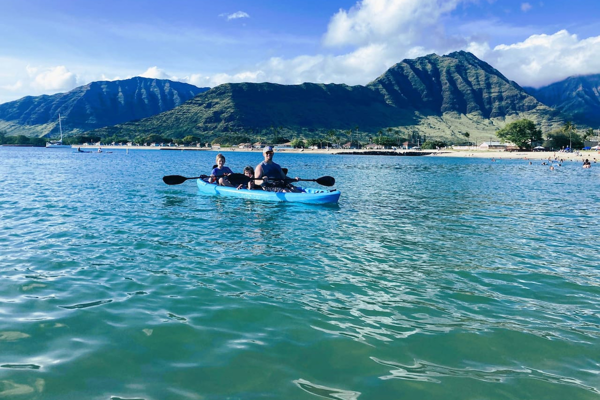 Kayaking by Jurassic Park movie's mountains in one of the 3 two-person kayaks in the home