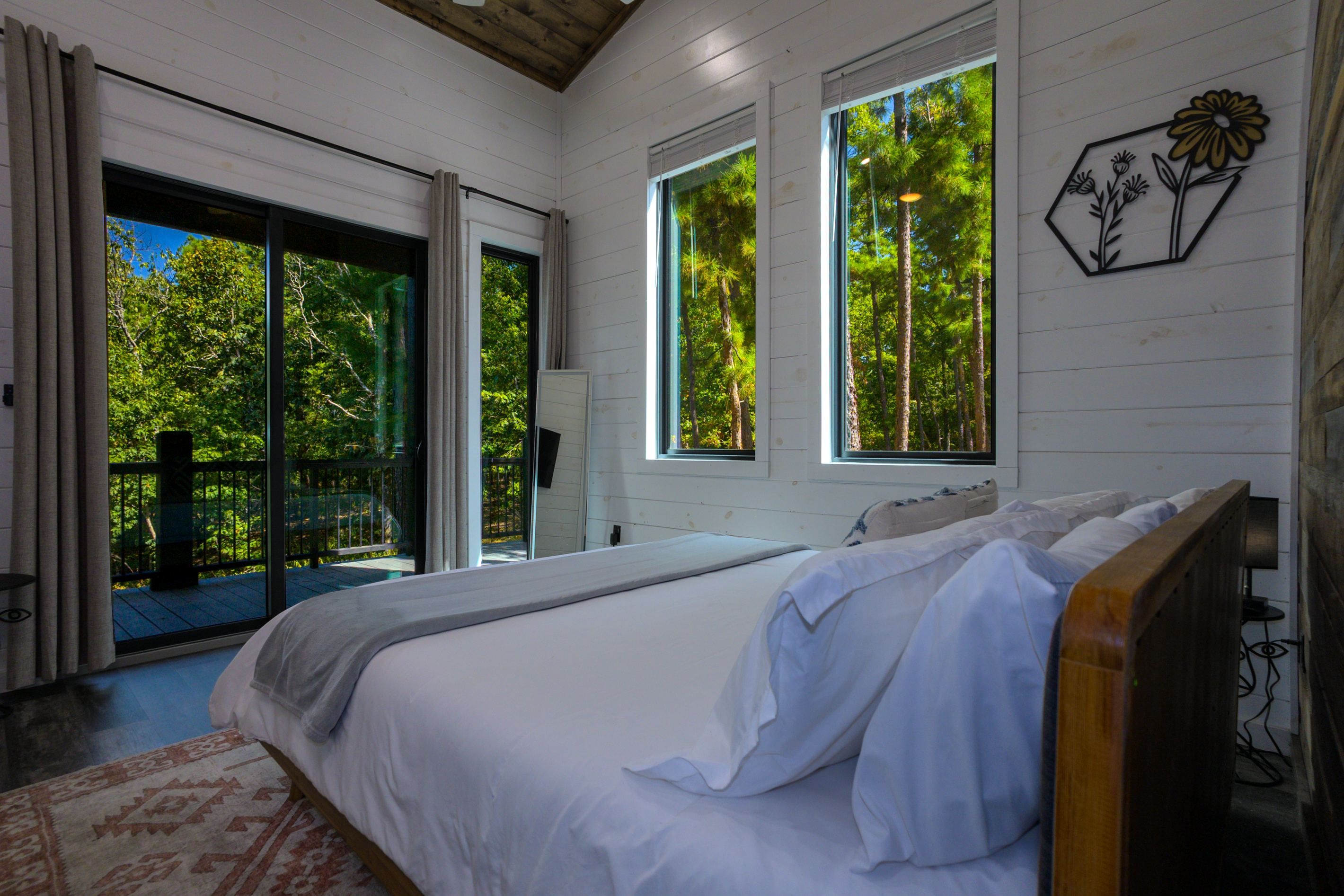 Each bedroom designed with an inviting decor and cozy bedding with an attached private patio to step out and enjoy nature!
