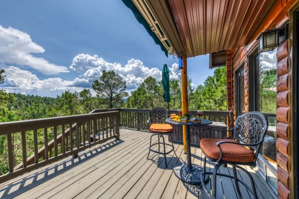 Enjoy your morning coffee or evening drink on the patio, complete with tables and chairs and surrounded by peaceful nature views.