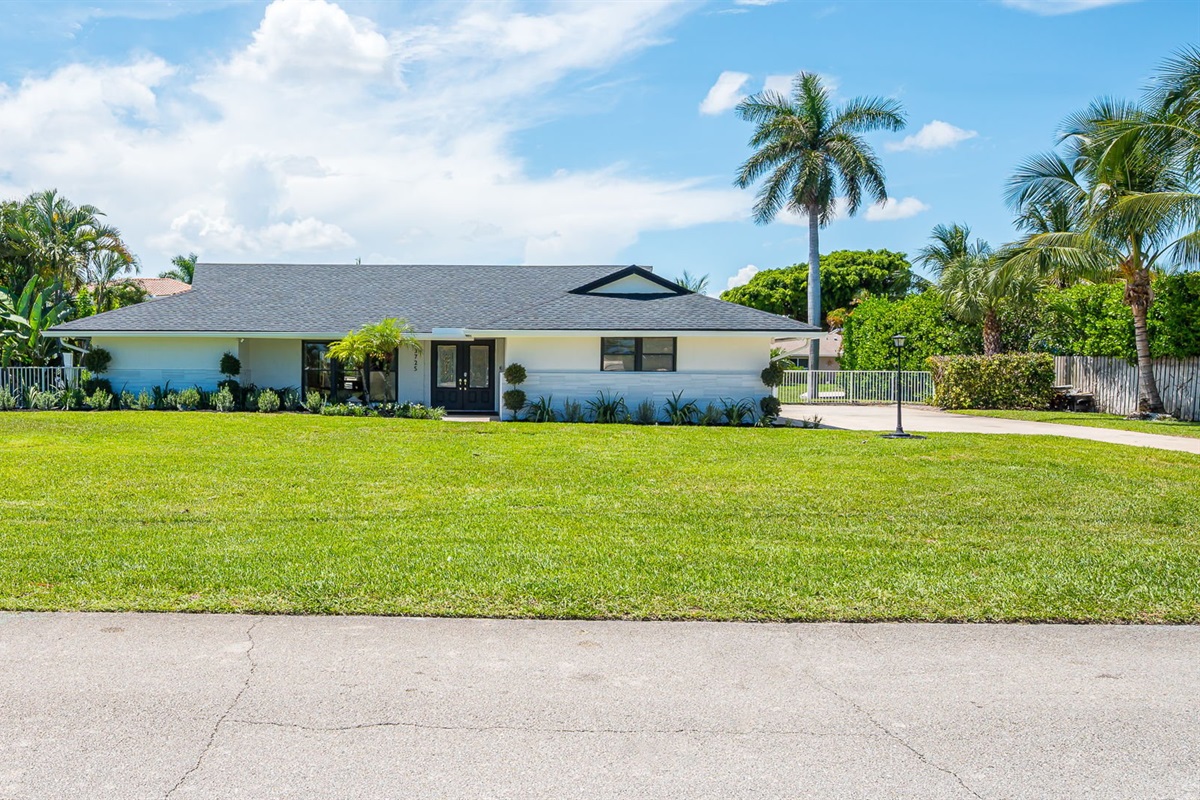 Welcome to this beautifully designed home with fresh landscaping and inviting curb appeal. The expansive driveway provides parking for up to three cars, making it ideal for families and groups. Located in a safe, family-friendly neighborhood