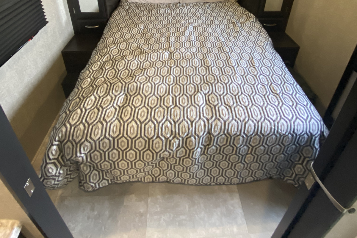 Master bedroom with ensuite bathroom, queen bed and ample storage to fully unpack