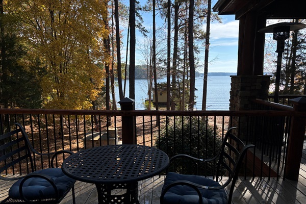 Cafe seating on deck outside primary bedroom