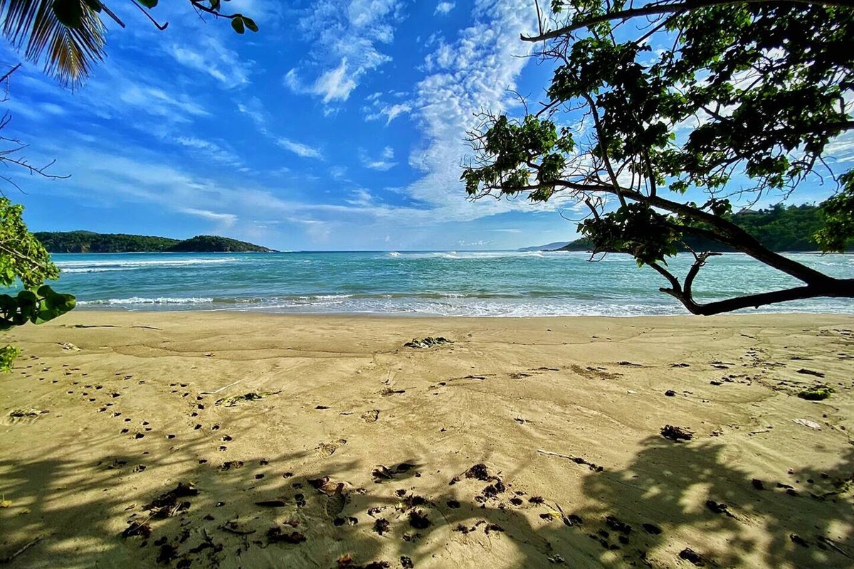 Just steps from a serene beach&mdash;your private retreat awaits.