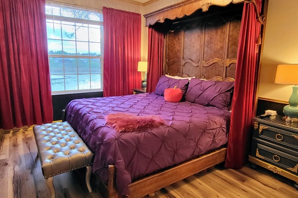 The Evil Queen’s Royal Suite, where mirrors are judgmental and the answer is always you.