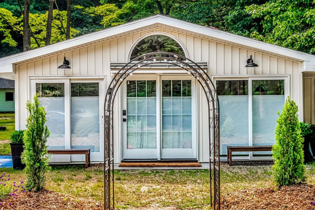 Wake up to beautiful views and golden hour glows. This charming home offers a private, peaceful setting with plenty of natural light and outdoor benches for soaking in the air. Features easy keyless entry for a smooth, contact-free arrival