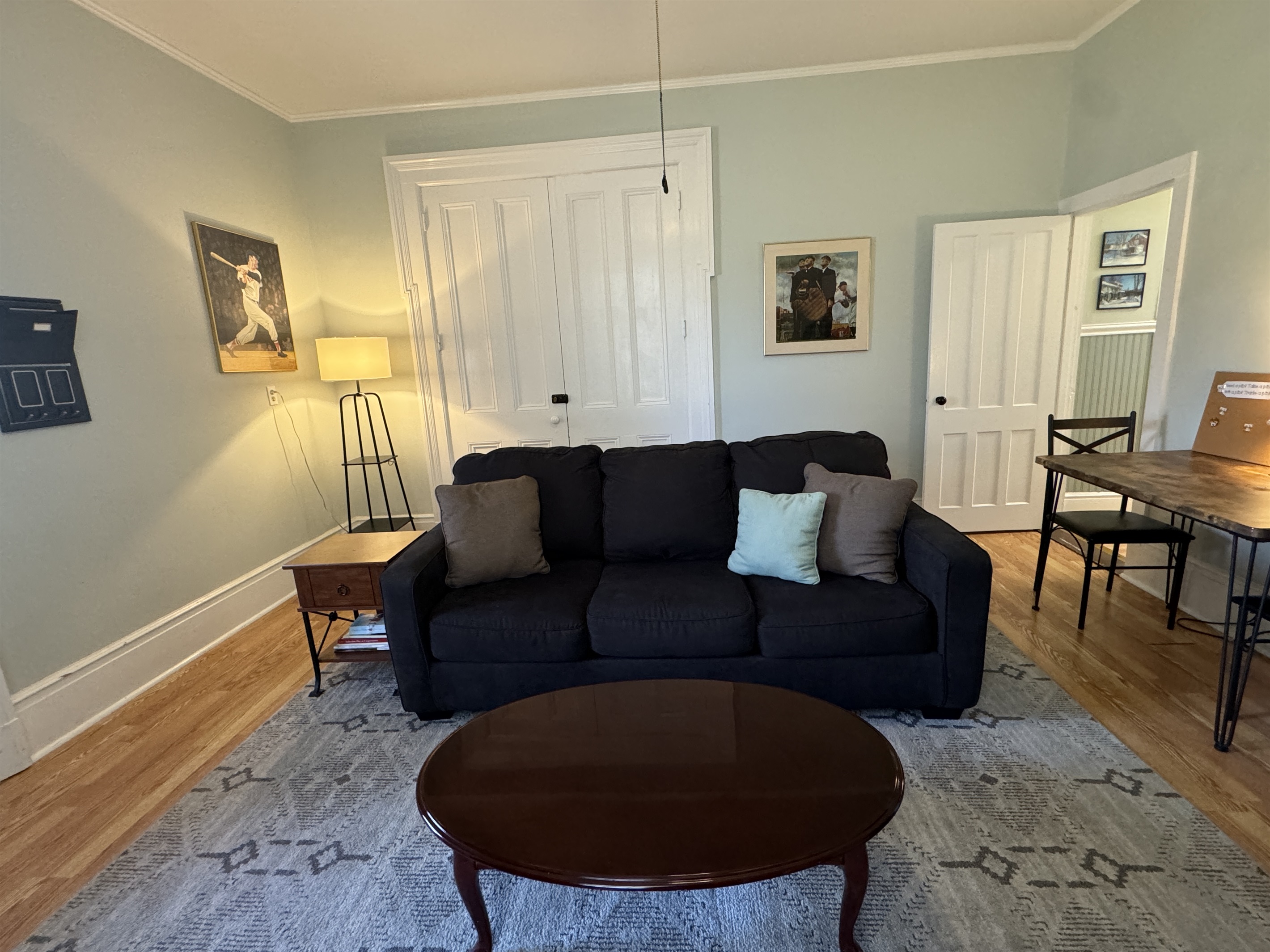 Living area with dining and kitchen beoynd
