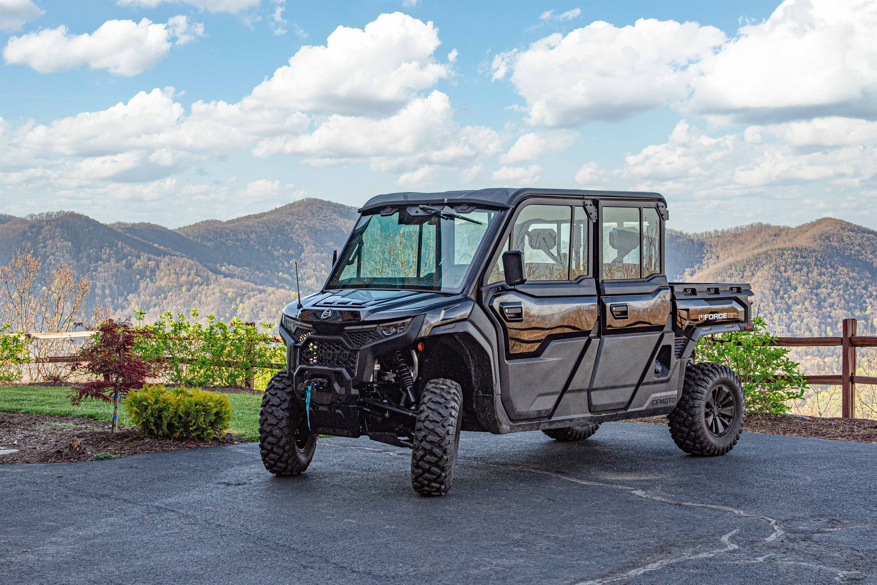 Adventure Awaits: Explore the mountains in our rugged UTV, parked with a stunning view!