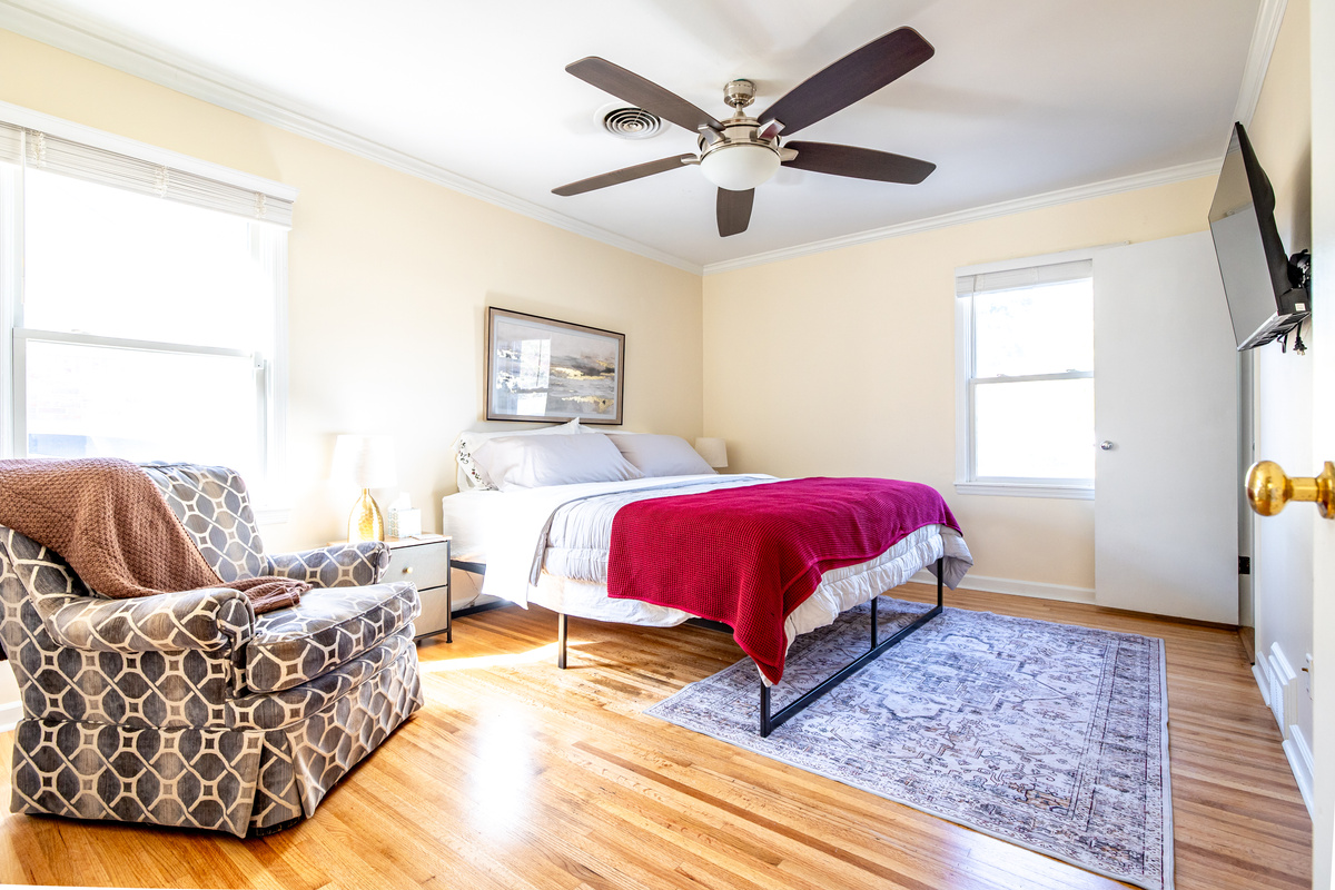 Primary bedroom. King bed. En-suite bathroom. TV