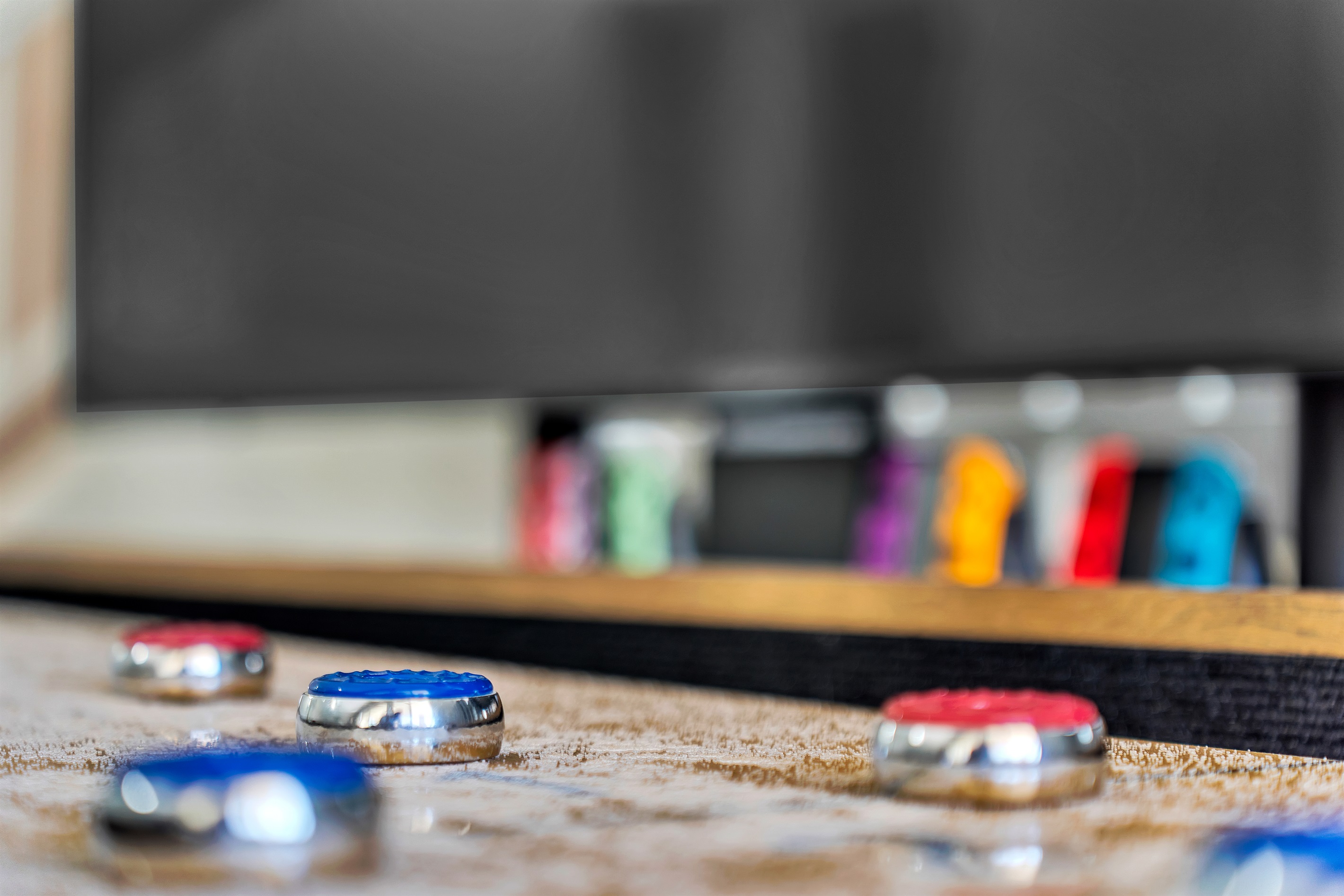 Living room 2 with 86 inch tv, shuffleboard, Nintendo switch, karaoke and bar sink