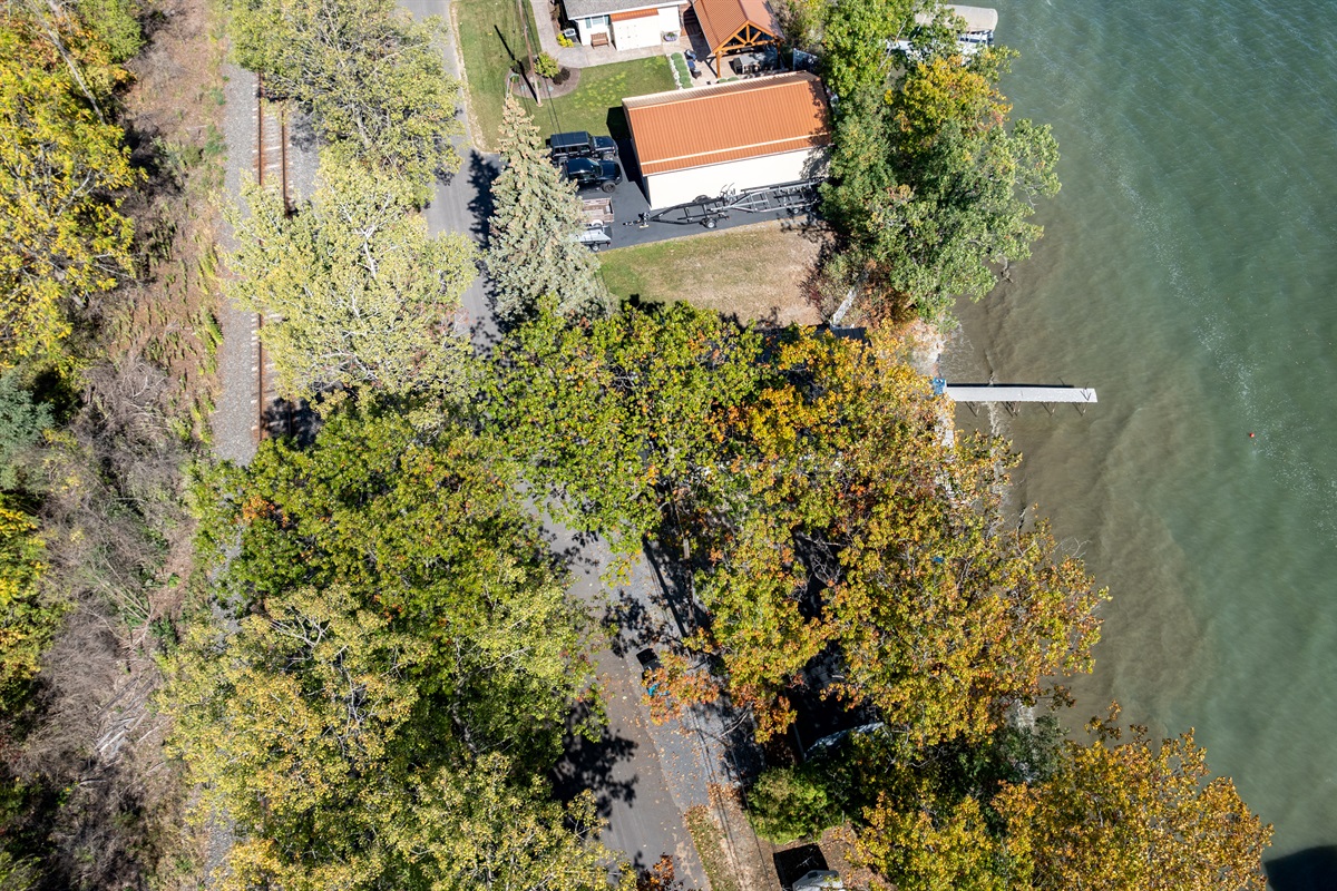Beautifully tucked between trees, this lakeside escape offers privacy and serenity