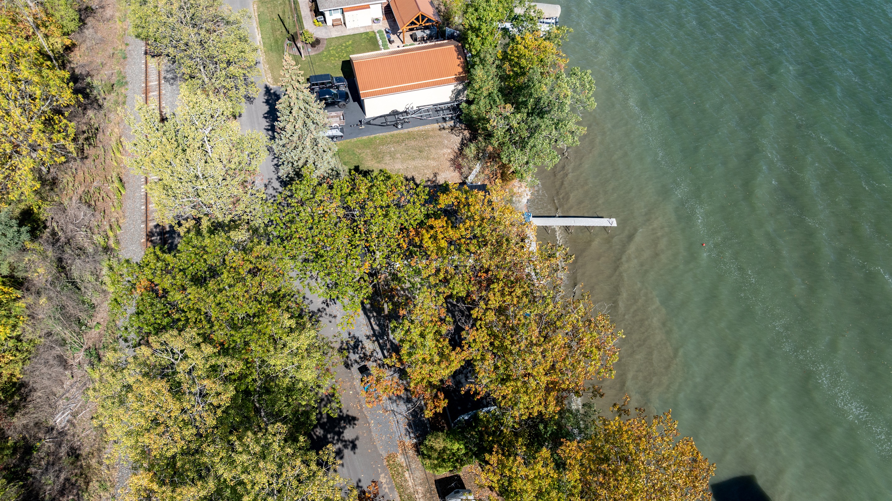 Beautifully tucked between trees, this lakeside escape offers privacy and serenity