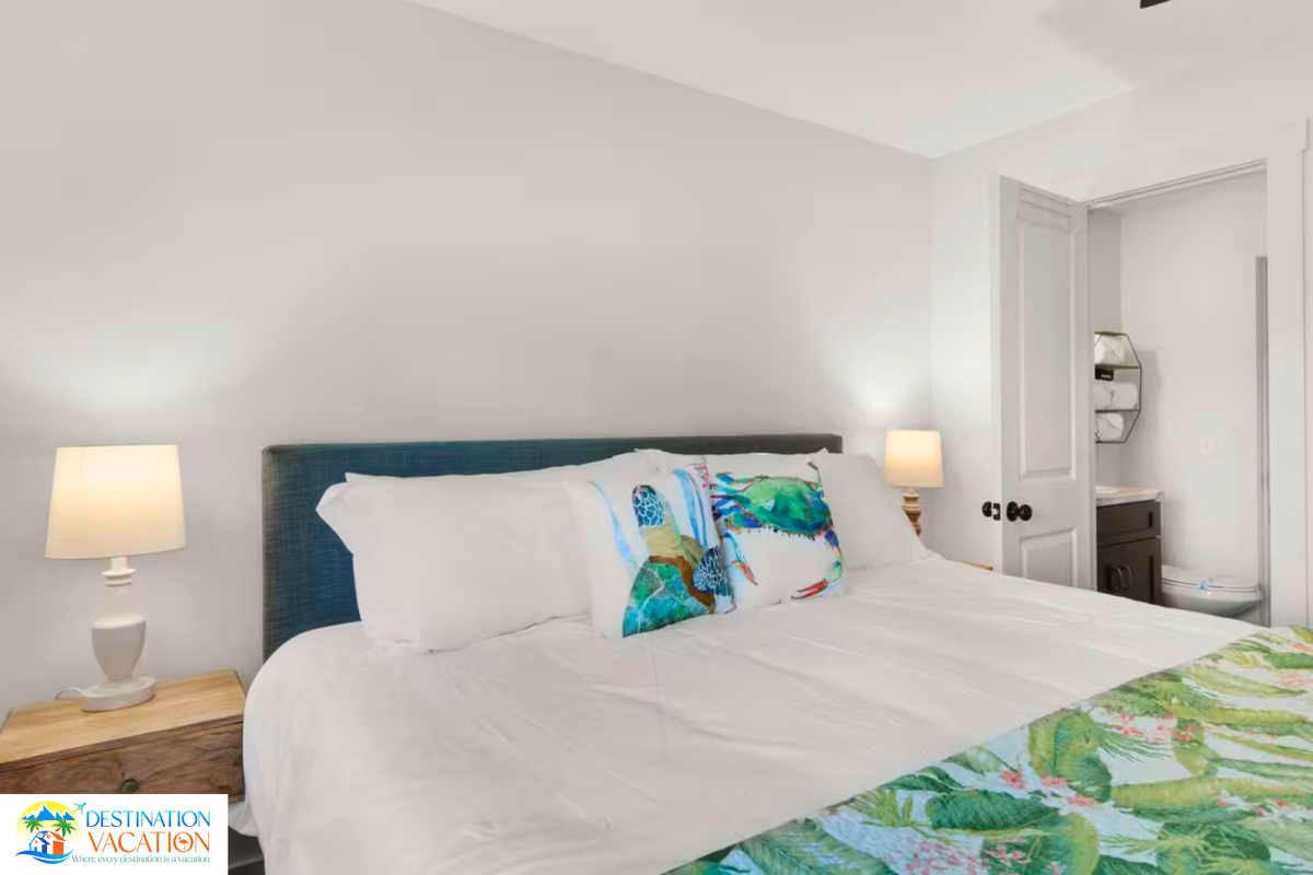 Coastal comfort surrounds you in this tranquil bedroom.