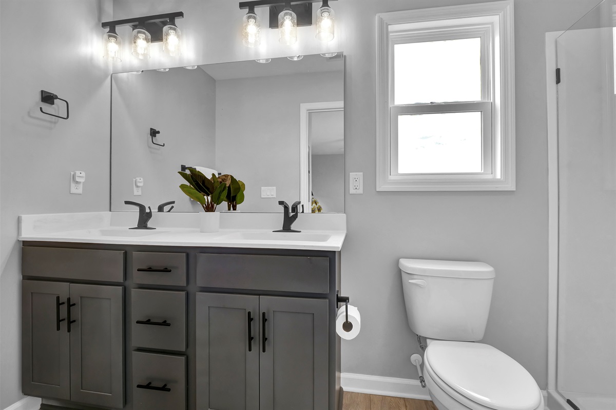 Enjoy extra space and convenience with this stylish double vanity 