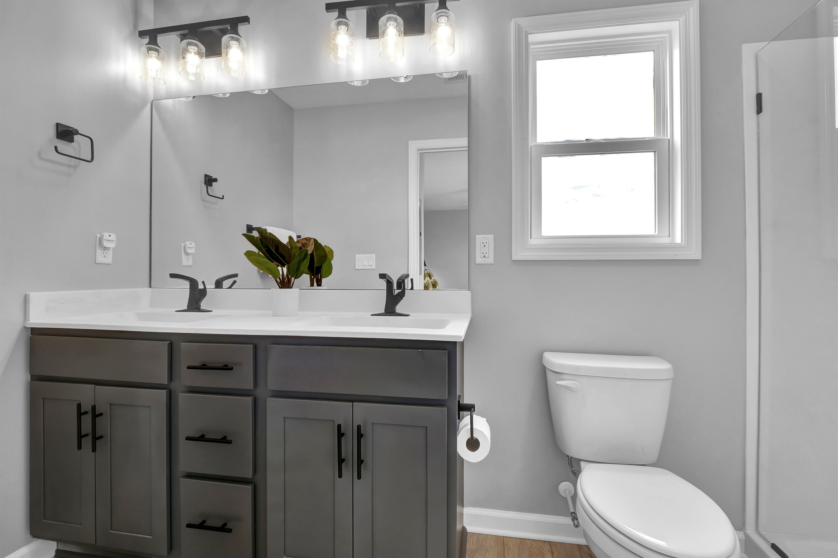 Enjoy extra space and convenience with this stylish double vanity 