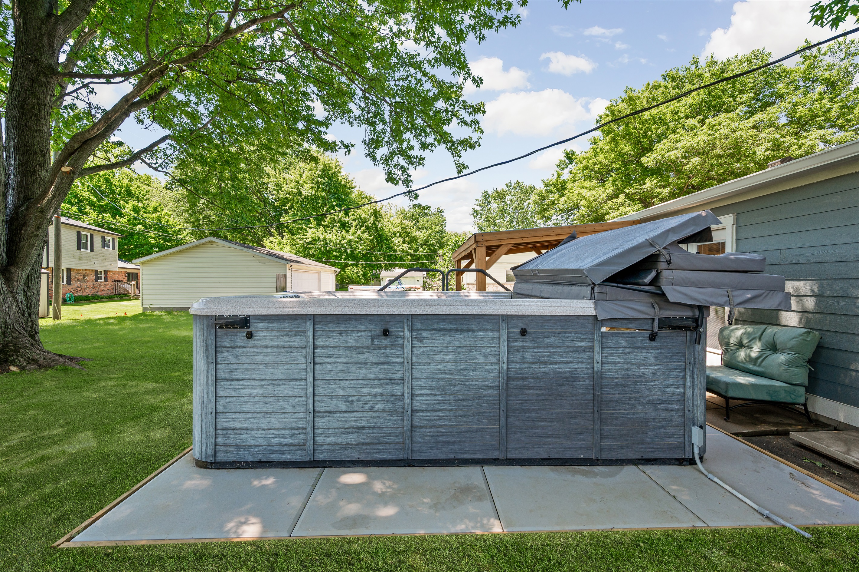 Relax and recharge in the outdoor 14ft swim spa, perfect for unwinding after a day exploring Indianapolis and Brownsburg.