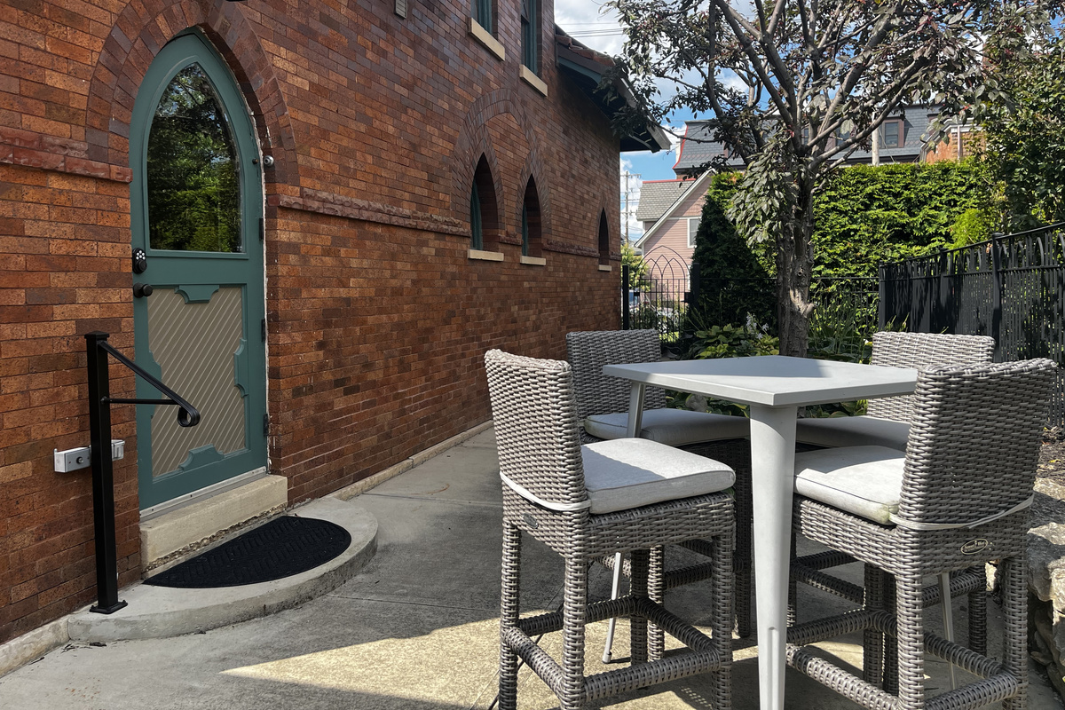 Bar-height patio table for four, right outside the side door