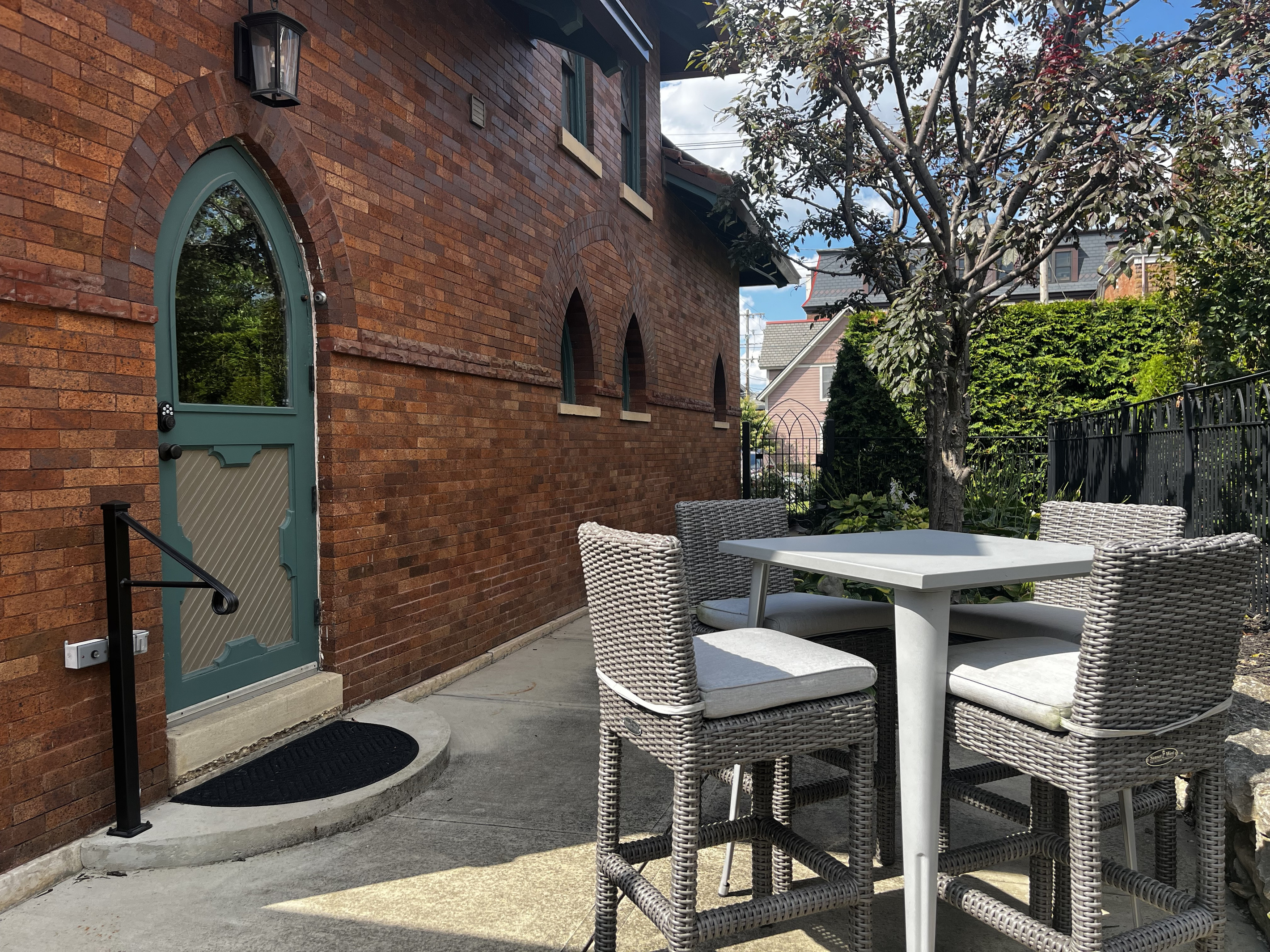 Bar-height patio table for four, right outside the side door