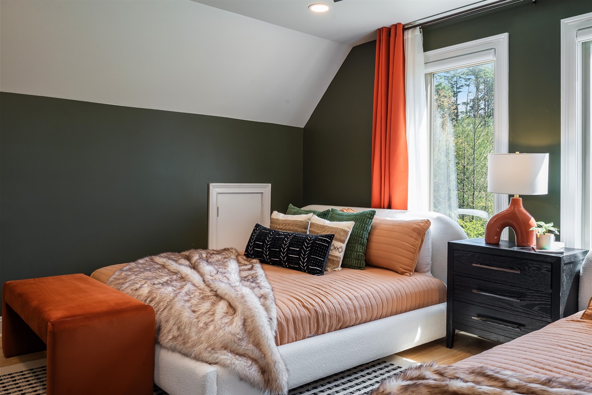 Cozy king bedroom with clean design and natural light - simple, comfortable, and easy to settle into