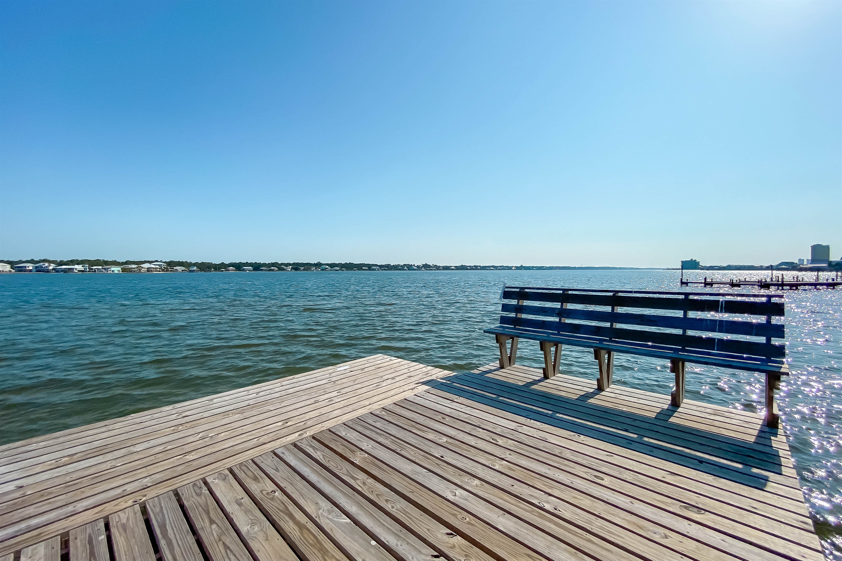 Cast a line from the private fishing pier at Gulf Shores Surf and Racquet Club, overlooking the tranquil waters of Little Lagoon.