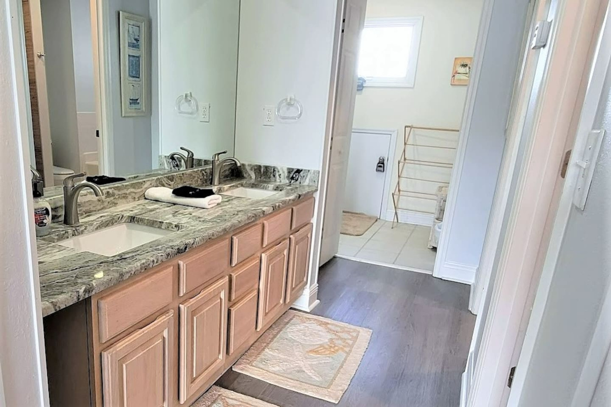 Start your morning at the granite double sink vanity in the king suite &mdash; plenty of room for two.
