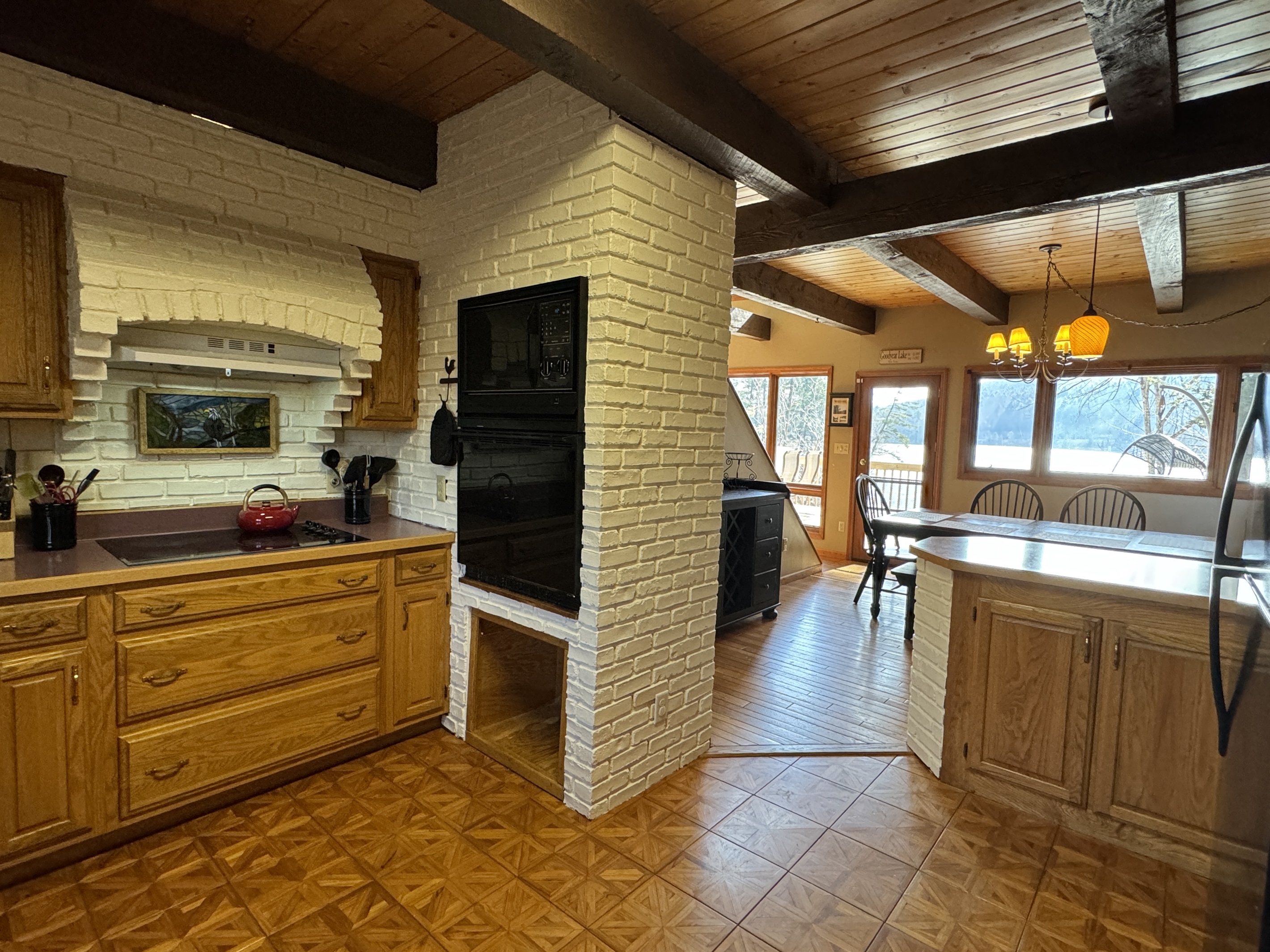 Camp Havon classic brick details make this kitchen very special as well as the view of the water while cooking!