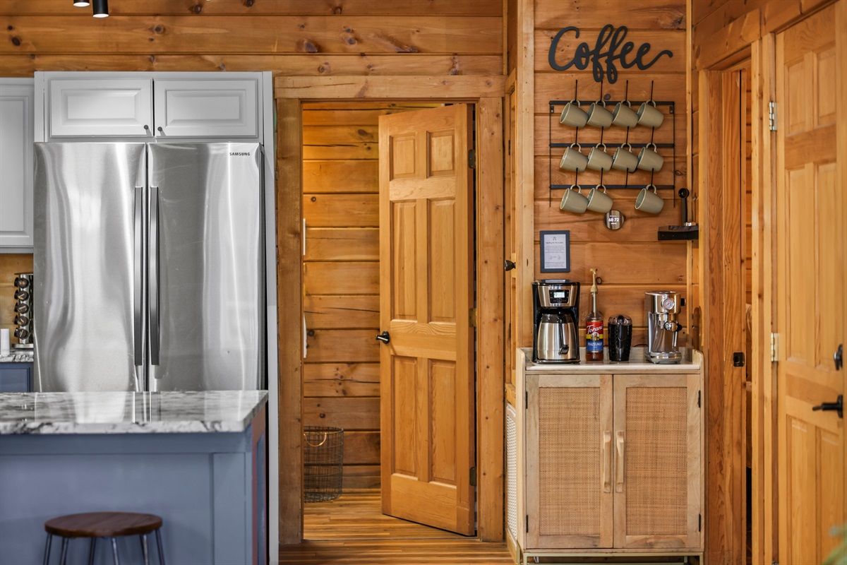 The coffee bar has everything you need including an espresso machine, regular drip coffee maker, a Keurig, coffee grinder, French Press and an electric teakettle.