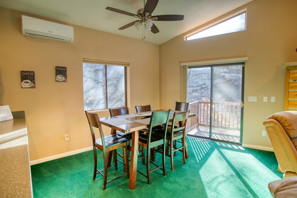 Bright, welcoming dining area perfect for shared meals and lively conversation.
