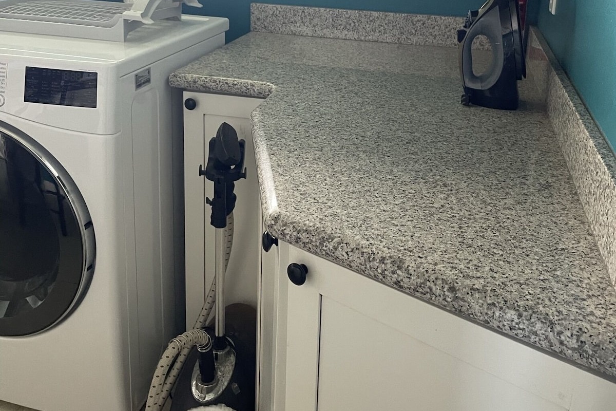 Large laundry room also has a steamer. Everything you need is here.