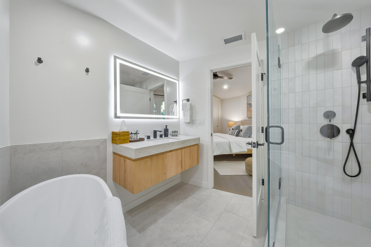 Primary bathroom with walk in shower and soaking tub