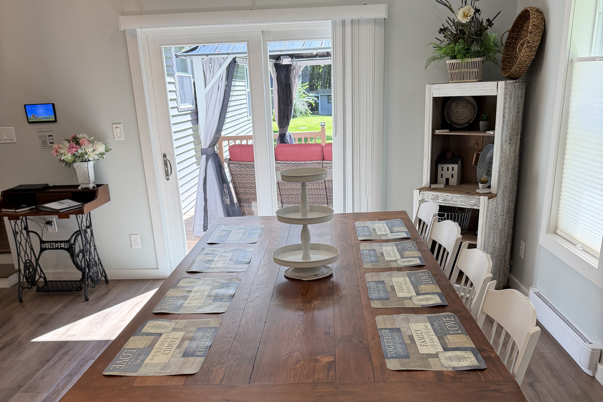Great Room with dining area with sliders to back deck