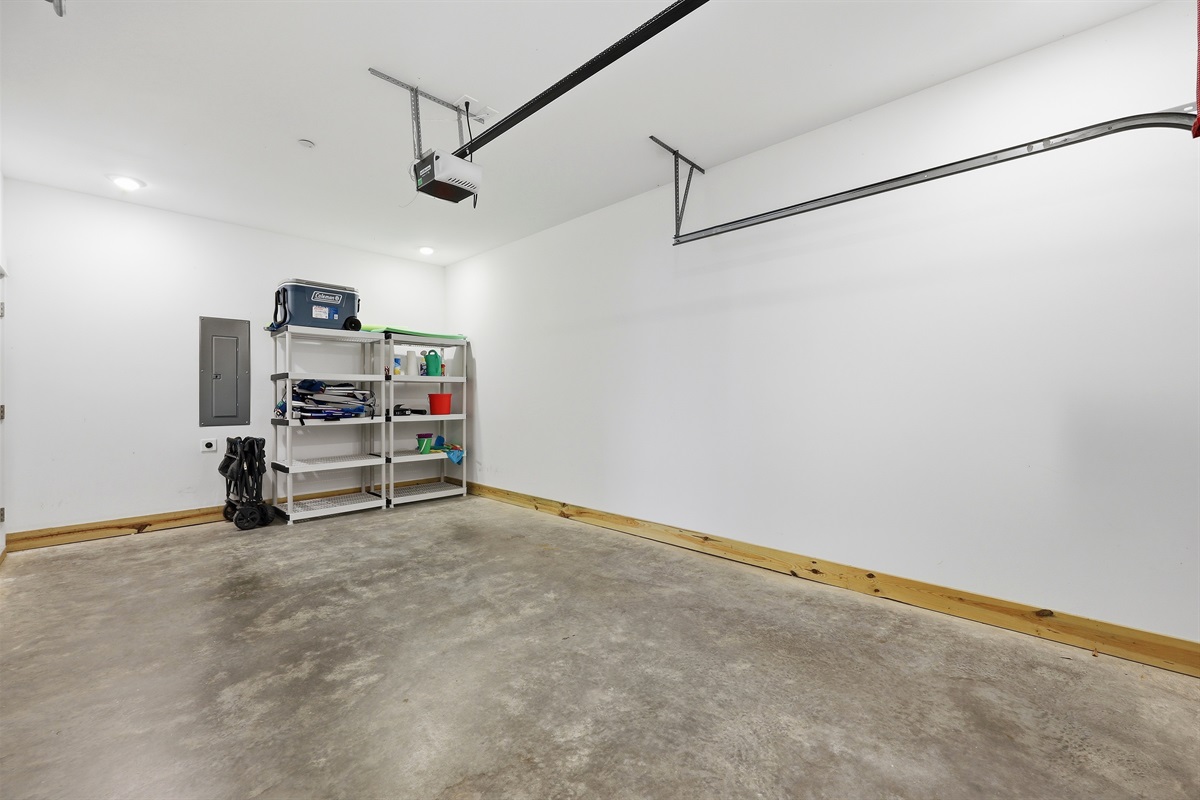 Spacious garage area for parking or storage
