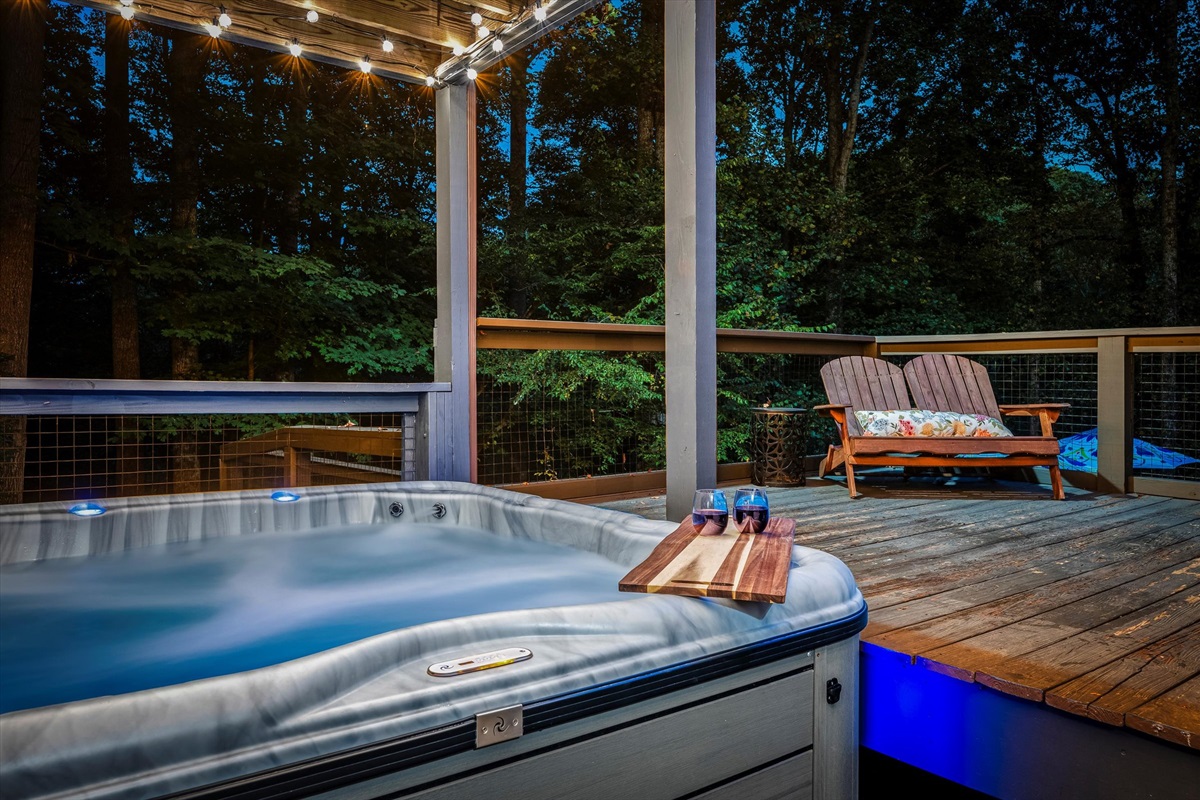 Soak beneath soft string lights and the sounds of nature after a day of adventures.